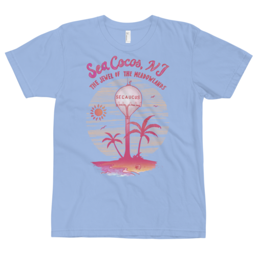 A baby blue t-shirt with a drawing of the water tower from Secaucus, NJ on a beach, with the words Sea Cocos, The Jewel of the Meadowlands. Designed by Kenny Velez.