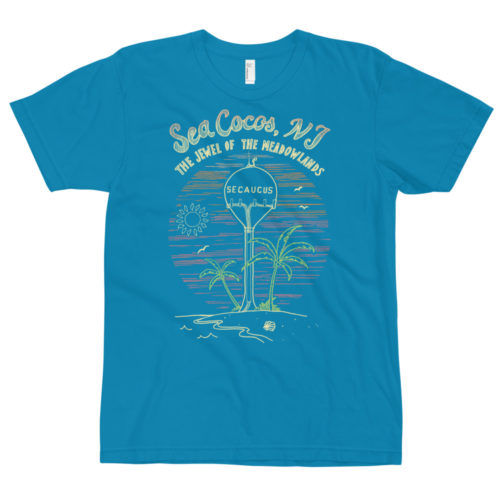 A teal blue t-shirt with a drawing of the water tower from Secaucus, NJ on a beach, with the words Sea Cocos, The Jewel of the Meadowlands. Designed by Kenny Velez.