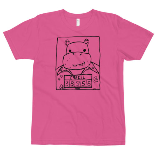 A fuchsia t-shirt with a drawing of a mugshot featuring a cartoon hippo in a Hawaiian shirt in the vein of the iconic mugshot of Pablo Escobar. Designed by Kenny Velez.