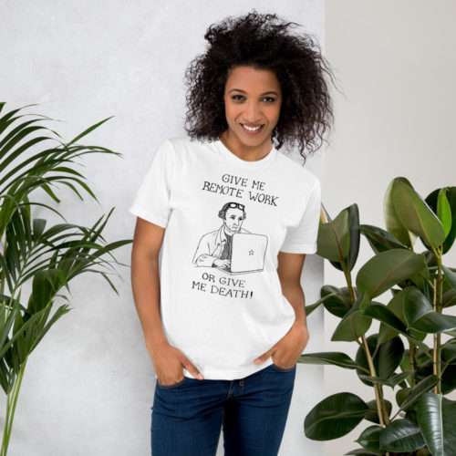 A girl wearing a white t-shirt of a drawing of founding father Patrick Henry working on a laptop with the words GIVE ME REMOTE WORK OR GIVE ME DEATH! Designed by Kenny Velez