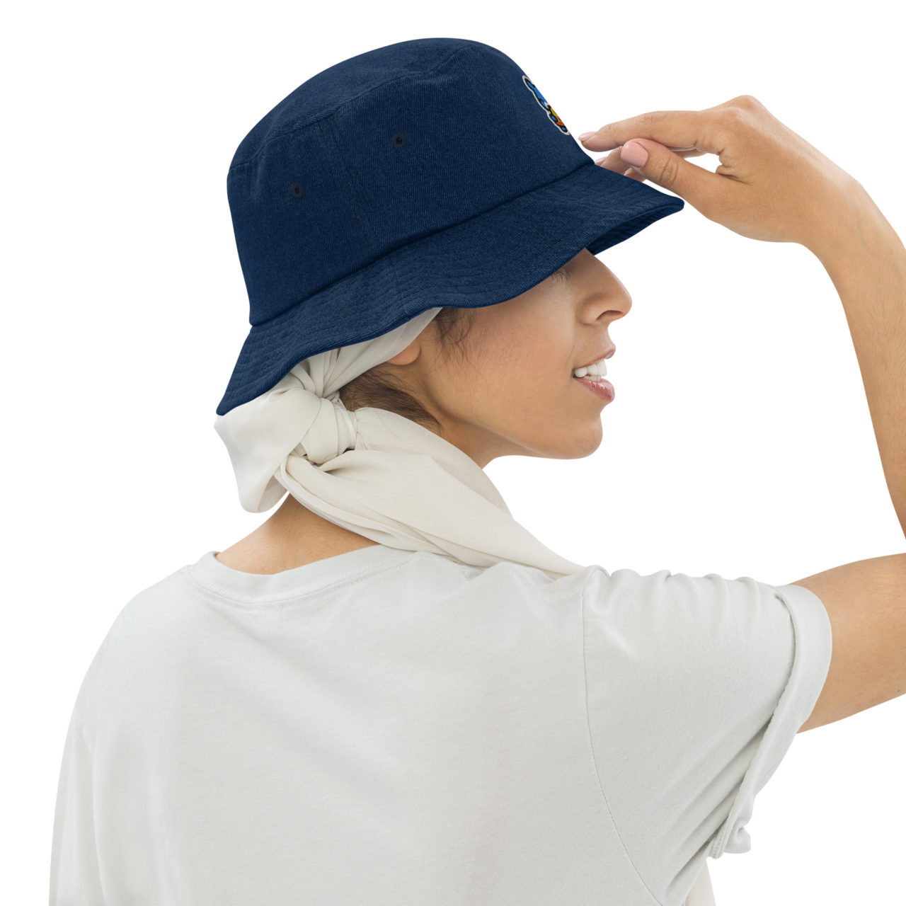 A woman wearing a blue Denim bucket hat with a squirrel eating a slice of pizza