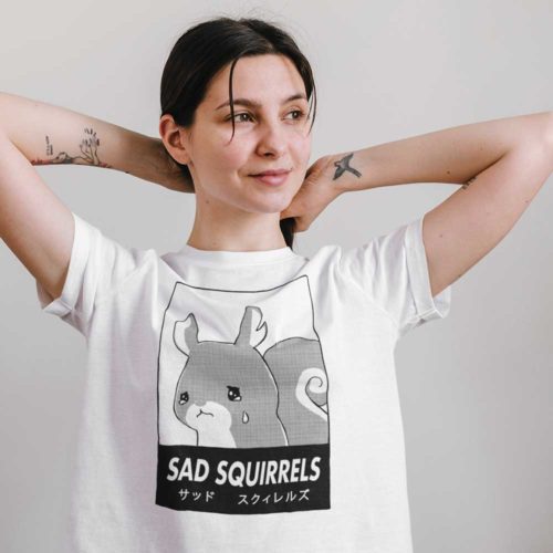 a girl wearing a White t-shirt with anime Sad Squirrels drawing and Japanese writing