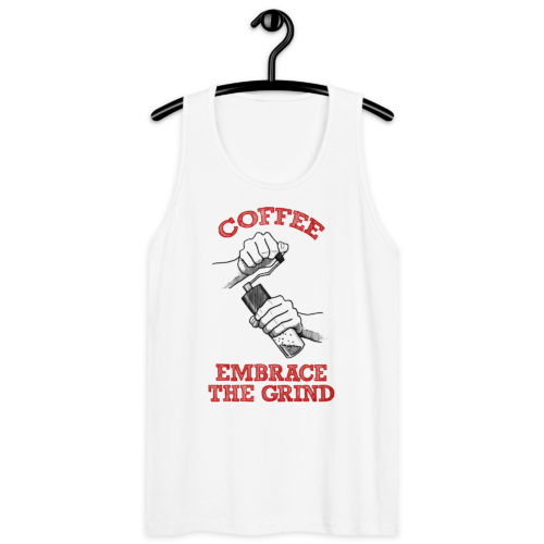 A white tank top with a drawing of hands using a handheld coffee grinder with the words COFFEE EMBRACE THE GRIND. Designed by Kenny Velez