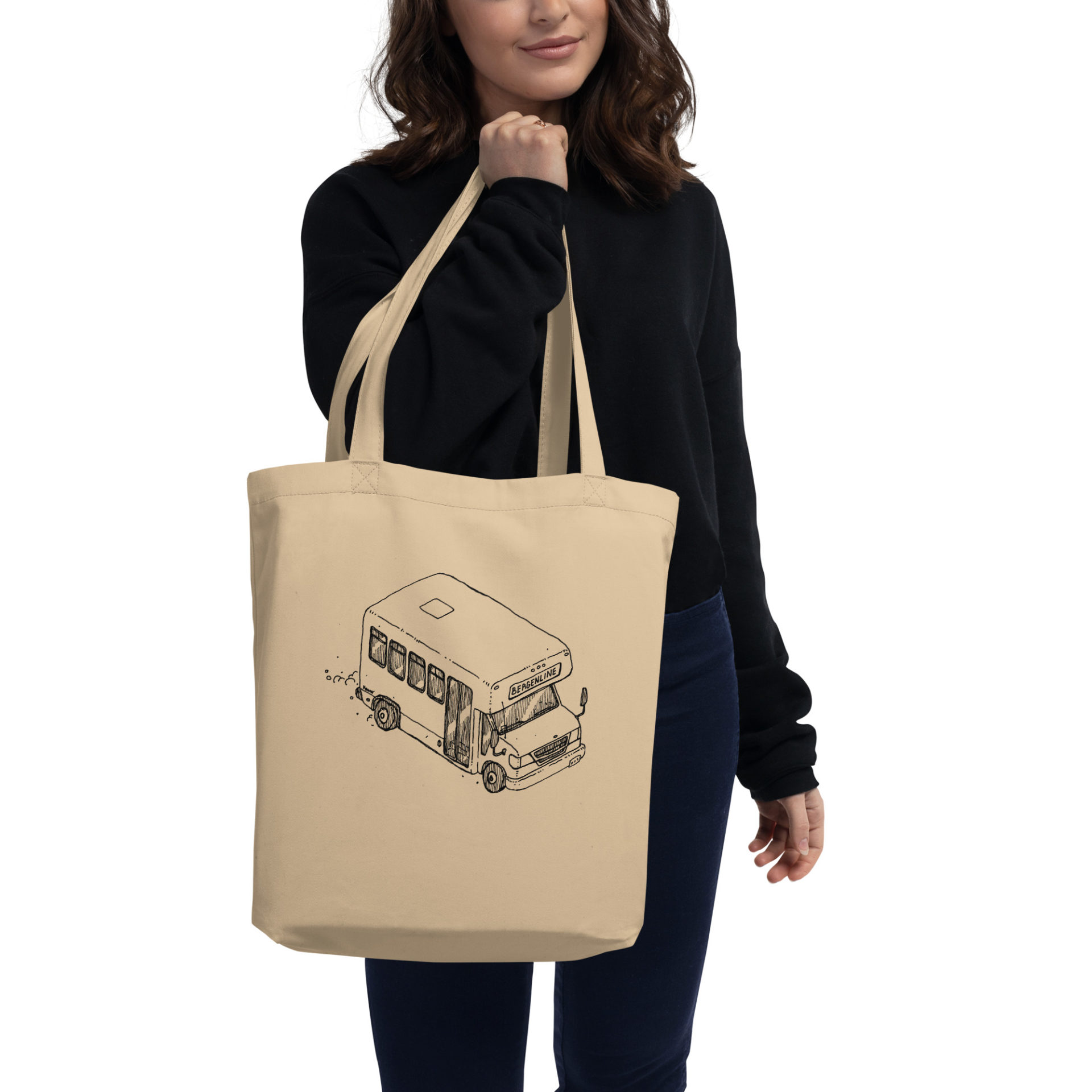 A tote bag with an ink drawing of a Bergenline jitney dollar bus from Union City, NJ. Designed by Kenny Velez