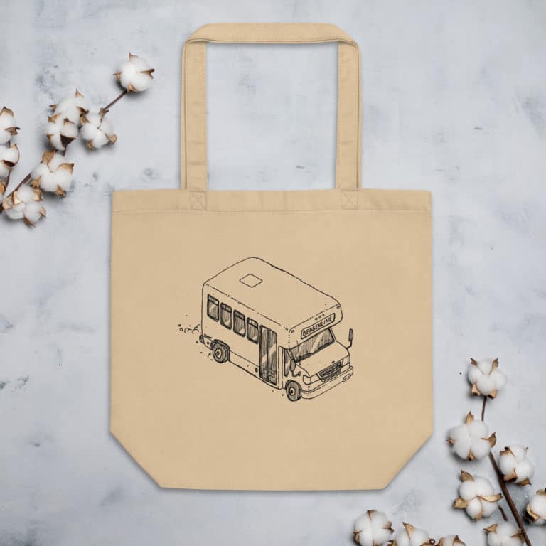 A tote bag with an ink drawing of a Bergenline jitney dollar bus from Union City, NJ. Designed by Kenny Velez