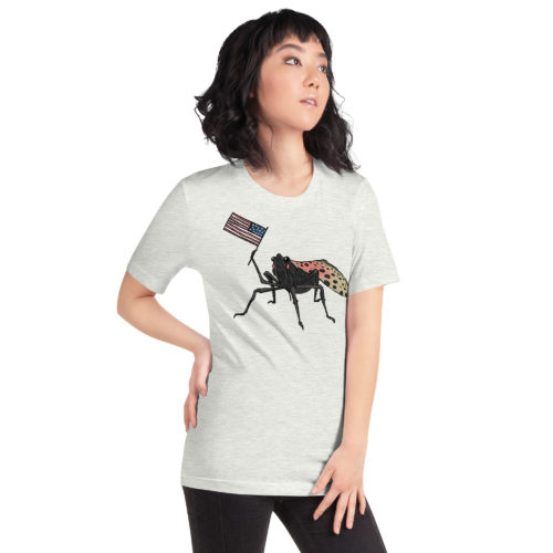 A girl wearing a t-shirt with a drawing of a spotted lantern fly waving a USA flag