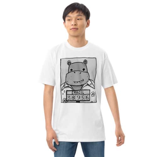a guy wearing a white t-shirt with a drawing of a mugshot featuring a cartoon hippo in a Hawaiian shirt in the vein of the iconic mugshot of Pablo Escobar. Designed by Kenny Velez.