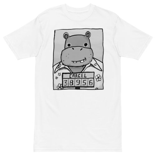 A white t-shirt with a drawing of a mugshot featuring a cartoon hippo in a Hawaiian shirt in the vein of the iconic mugshot of Pablo Escobar. Designed by Kenny Velez.