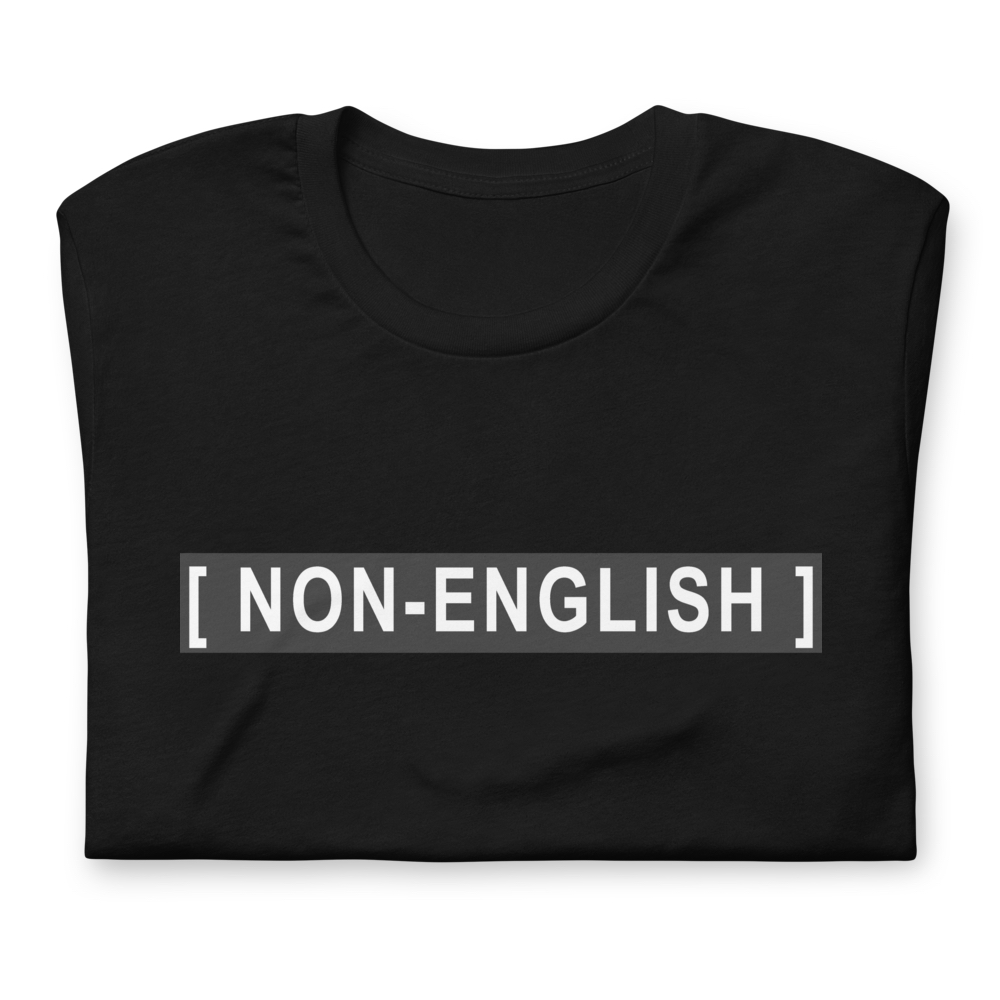 Black t-shirt with the words [NON-ENGLISH], after Bad Bunny's 2023 Grammys performance in which his Spanish was captioned as Non-Spanish.