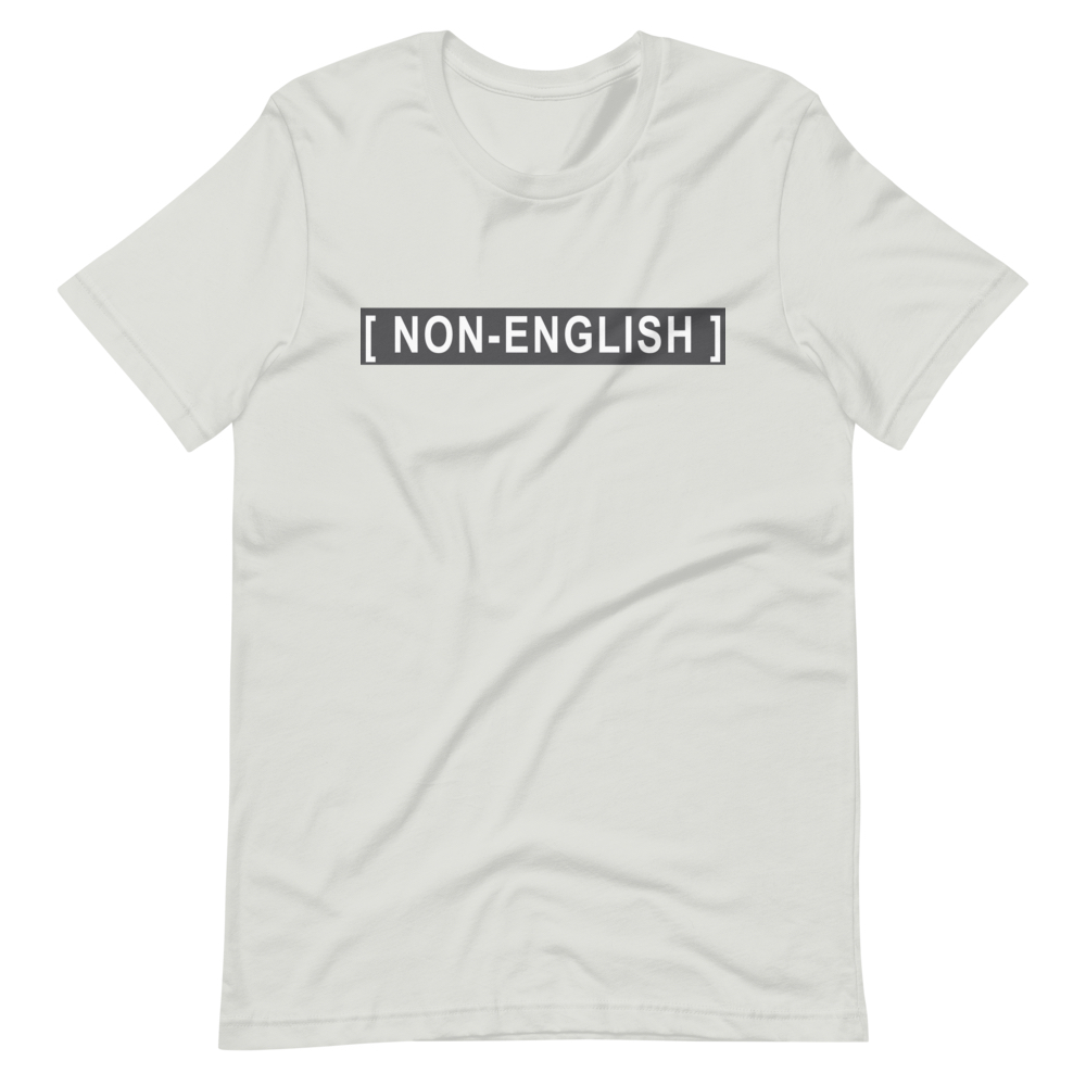 Silver t-shirt with the words [NON-ENGLISH], after Bad Bunny's 2023 Grammys performance in which his Spanish was captioned as Non-Spanish.