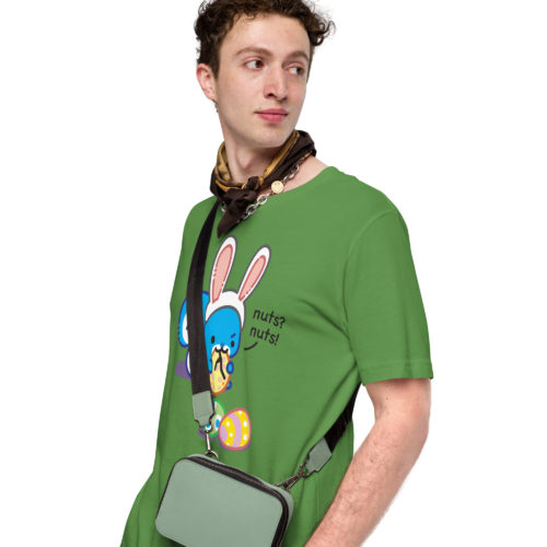 a guy wearing a green shirt with Ma Squirrel wearing fake bunny ears tying to eat an easter egg