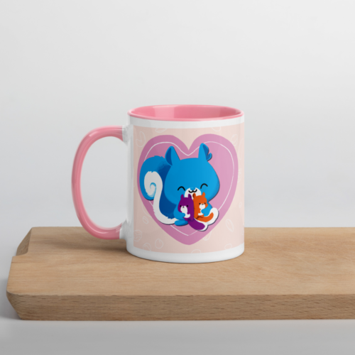 a white mug with a pink interior featuring a kawaii Ma Squirrel holding her two kids in front of a heart.