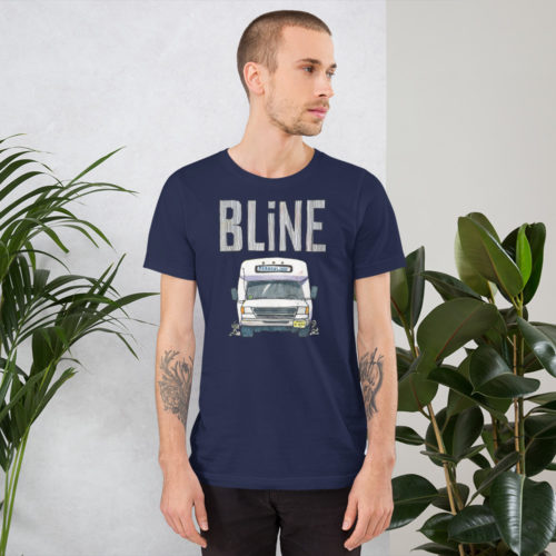 a man wearing a navy blue t-shirt with a drawing of a Bergenline jitney dollar bus from Union City, NJ with word BLine on top. Designed by Kenny Velez