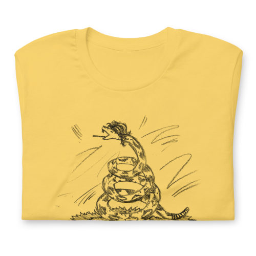 a yellow t-shirt with a drawing of a modified Gadsden flag but drawn in pencil with the words Don't Take on Me. A play on the a-ha - Take On Me Music Video. The snake has a mullet.