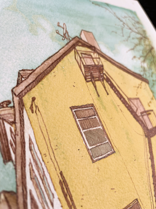 Closeup of watercolor and pen painting of an abandoned building and a dog walker in Union City, New Jersey.