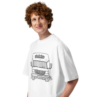 A guy with a white t-shirt with a drawing of a Bergenline jitney dollar bus from Union City, NJ. Designed by Kenny Velez