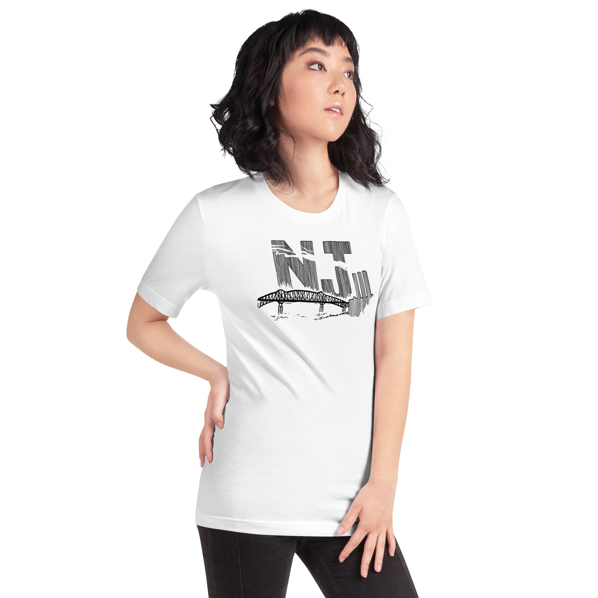 A woman wearing a white t-shirt with a line drawing of the Pulaski Skyway and Kearny power plant with the initials NJ. Designed by Kenny Velez.
